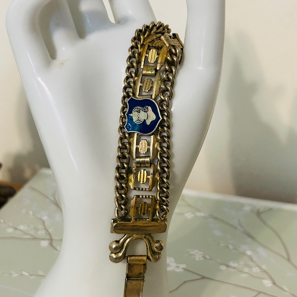 Vintage Gold-Tone Chain Bracelet with Blue Enamel Crest